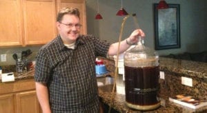 Racking an amber ale early on in my homebrew journey. Beer photo circa 2013.