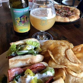 Red Rock Brewery's Buffalo Point Hazy IPA and Slackwater's Joe Pesci sandwich.